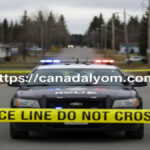 شريط تحذير الشرطة وسيارات الطوارئ في موقع حادث إطلاق نار في تاملر ريدج بكولومبيا البريطانية -صوت كندا اليوم.