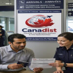 A traveler speaking with a CBSA officer about applying for asylum in Canada at the airport while holding a Basis of Claim document.