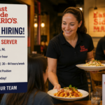 Food server at East Side Mario's restaurant in St. John's, Canada, highlighting the company's recruitment for a permanent full-time hospitality position.